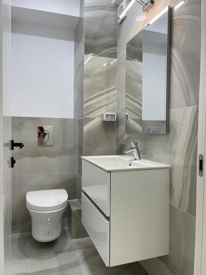 Apartament cu 3 camere decomandat în Polonă