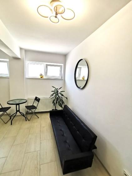Apartament cu 2 camere semidecomandat, mobilat în Central