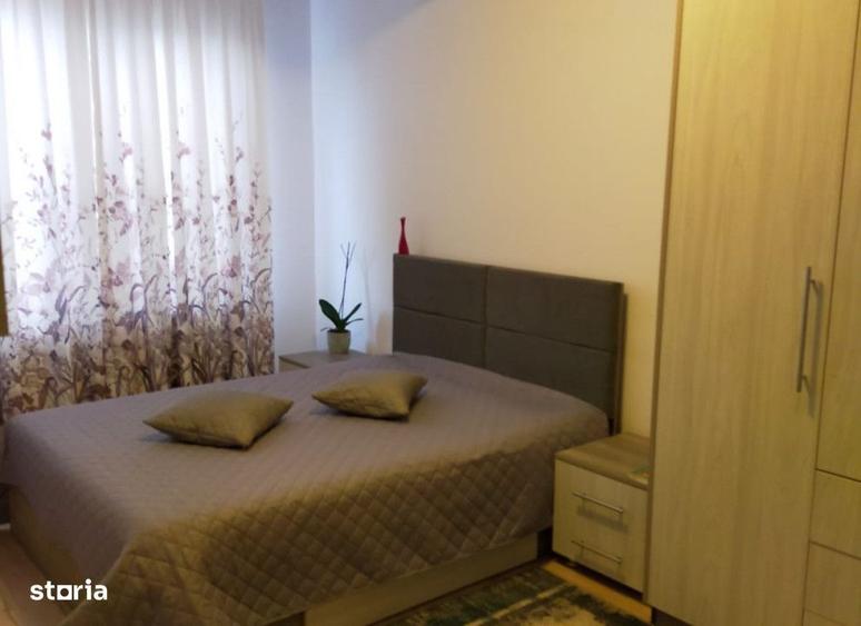 Apartament cu 2 camere decomandat în Bucium — fotografia 1