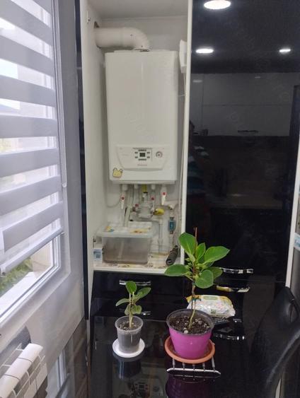 Apartament cu 4 camere decomandat în Central
