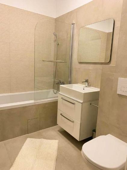 Apartament cu 3 camere semidecomandat, mobilat în Tunari
