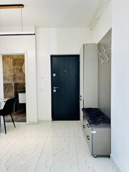 Apartament cu 2 camere semidecomandat, mobilat în Central