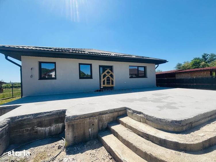 Casa noua, finisata complet, cu teren generos de 1.200 - 1