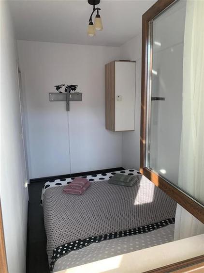 Apartament cu 2 camere semidecomandat, mobilat în Centru Civic