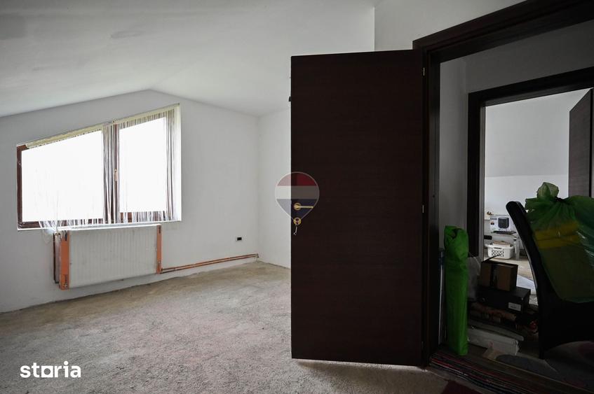 Casă cu 4 camere cu Teren 1000 Mp în Hărman
