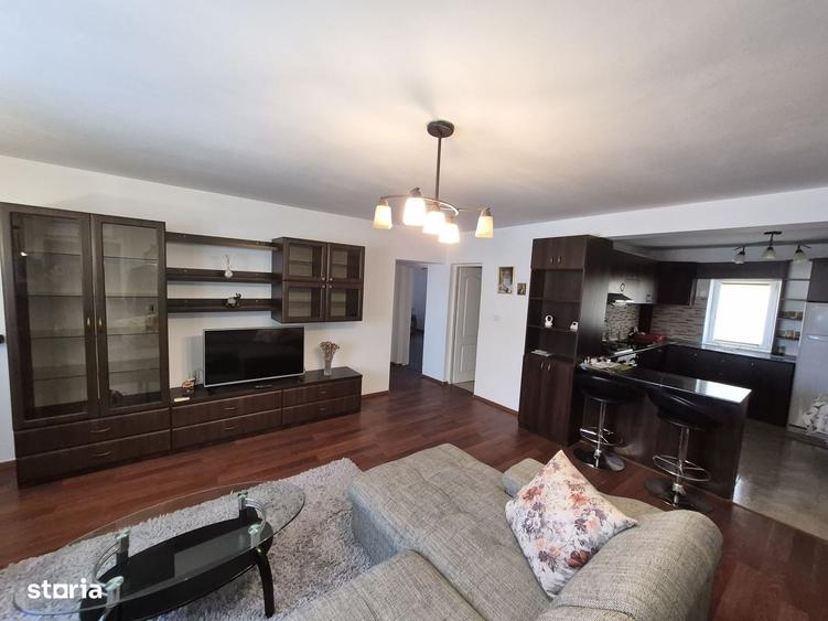 Apartament cu 4 camere decomandat în Bucium