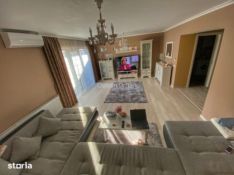Casa cu 4 camere, curte ?i aer condi?ionat