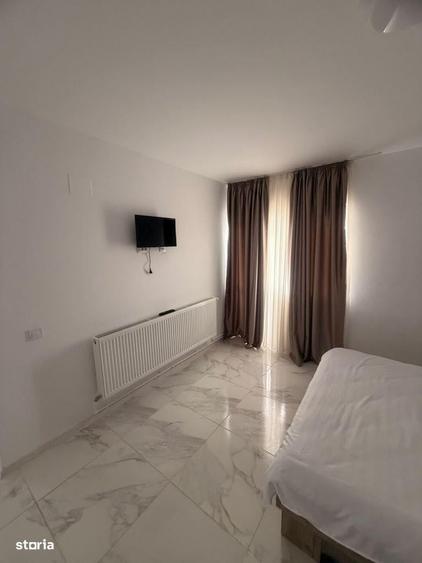 Apartament cu 2 camere semidecomandat, mobilat în Periferie