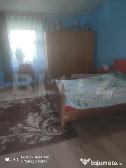 Casa 2 camere, 124mp utili, teren imprejmuit 3500mp, comuna - 3