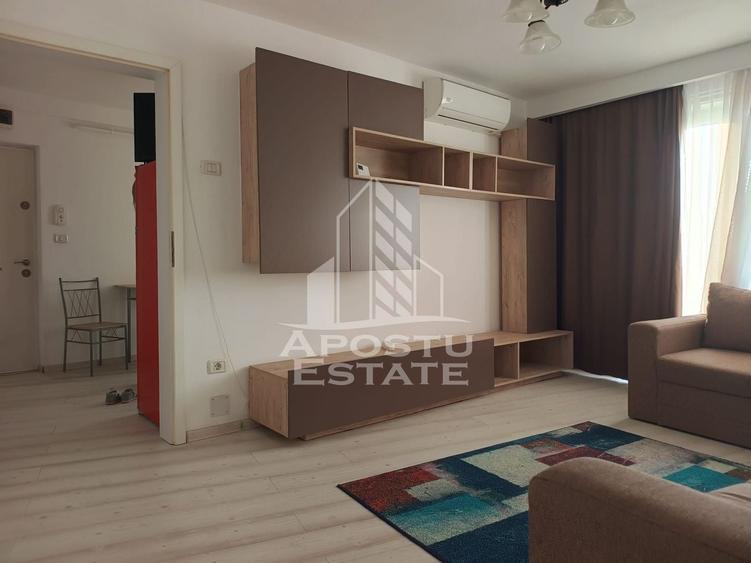 Apartament cu 2 camere semidecomandat, mobilat în Băncilor
