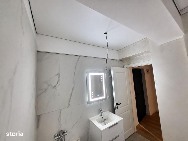 Apartament cu 2 camere semidecomandat în Bucium