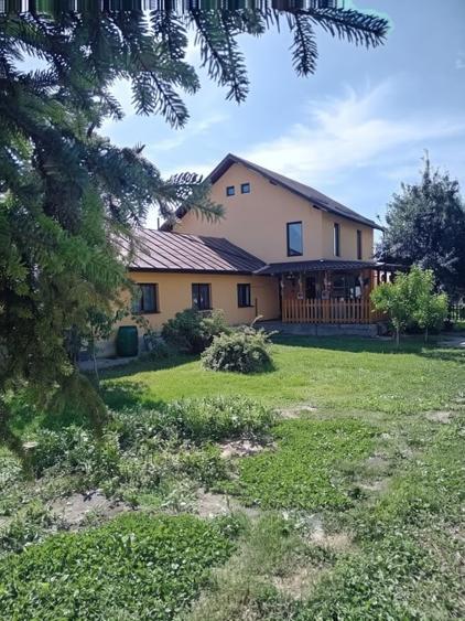 Casă individuală cu 5 camere cu Canalizare în Bătești