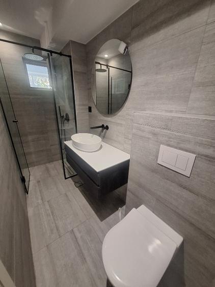Apartament cu 4 camere decomandat în Central