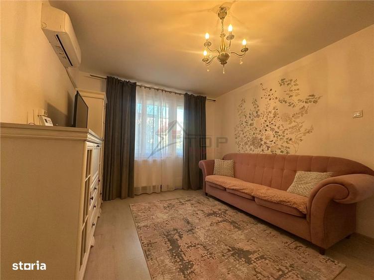 Apartament cu 2 camere semidecomandat, mobilat în Podu Roș