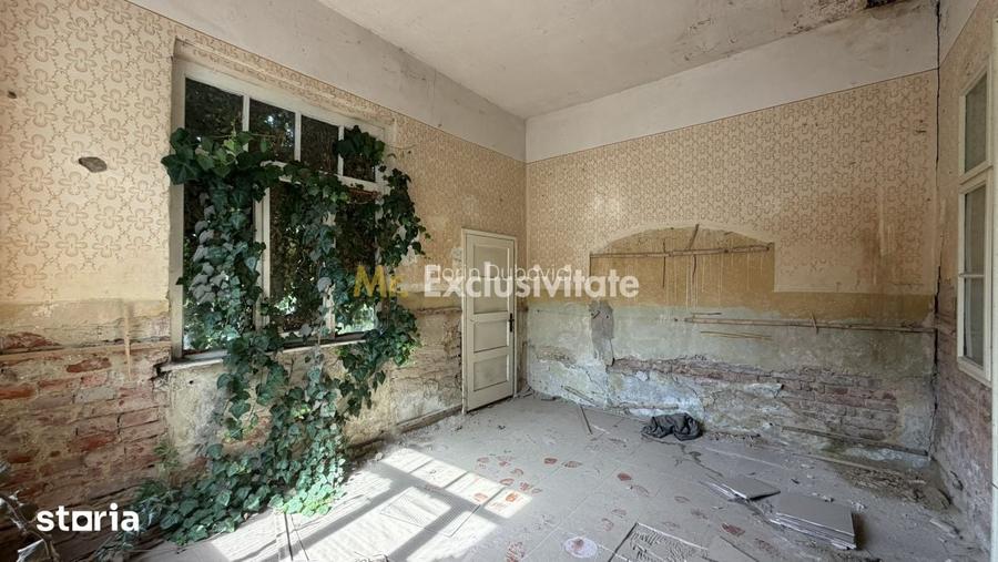 Casa de renovat cu teren 557 mp, central Str. Gh. Bari?iu - Carei