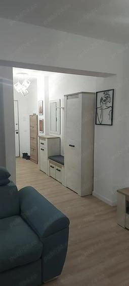 Apartament cu 2 camere semidecomandat, mobilat în Central