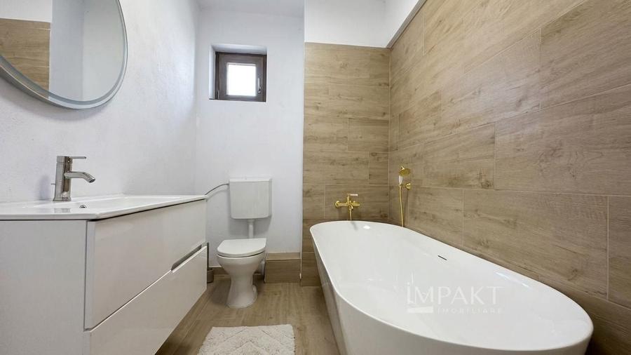 Apartament cu 3 camere semidecomandat, mobilat în Borhanci