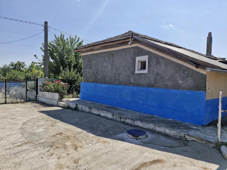 Casă cu Teren 1500 Mp în Tortoman