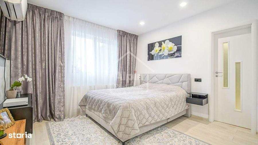 Apartament cu 4 camere decomandat în Tractorul