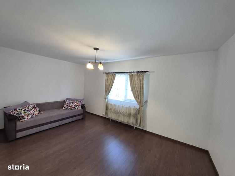 Apartament cu 4 camere decomandat în Bucium