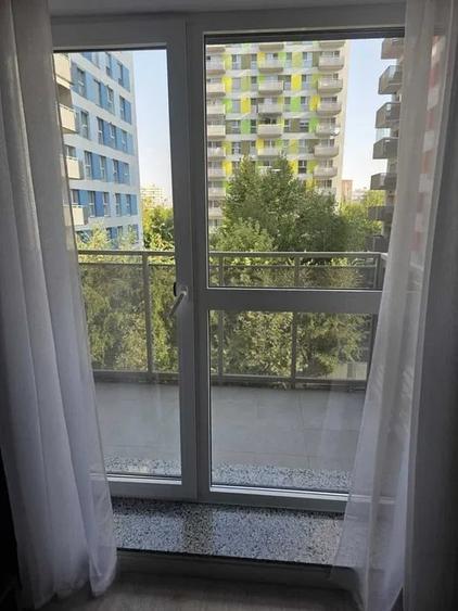 Apartament cu 2 camere semidecomandat, mobilat în Costin Georgian