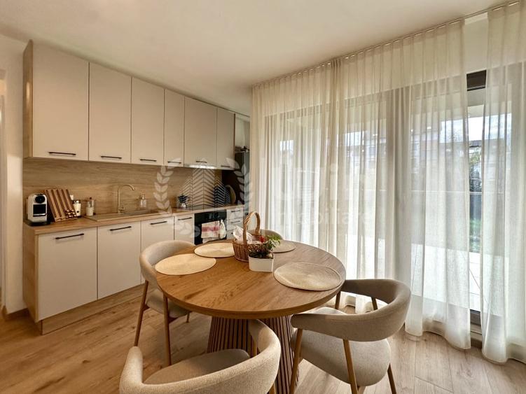 Apartament cu 3 camere semidecomandat, mobilat în Borhanci