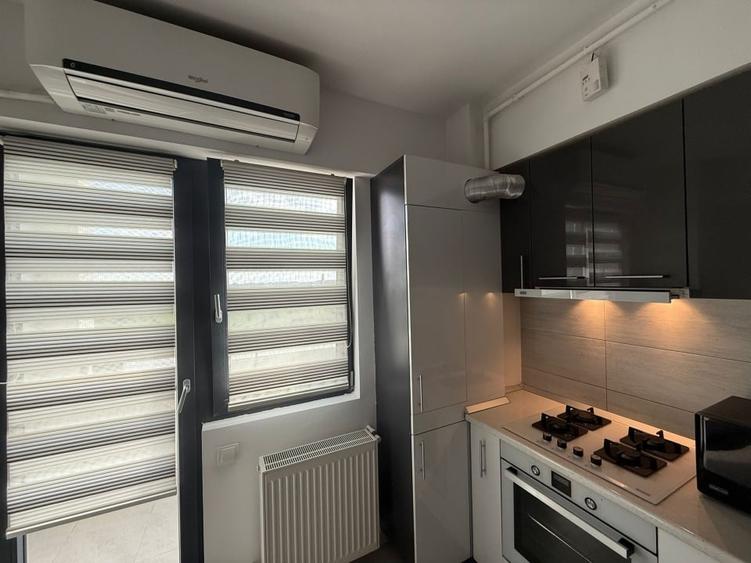 Apartament cu 2 camere semidecomandat, mobilat în Central