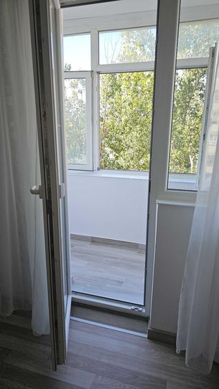 Apartament cu 2 camere decomandat în Podu Roș