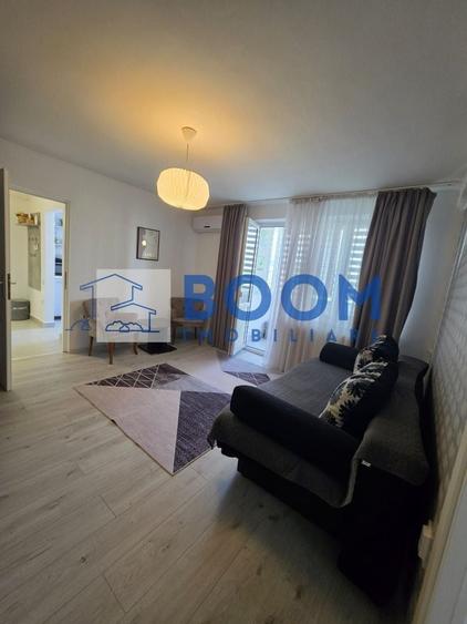 Apartament cu 2 camere semidecomandat, mobilat în 1 Mai