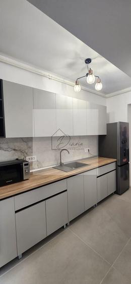 Apartament cu 2 camere semidecomandat, mobilat în Central