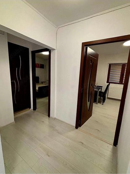 Se ofera spre inchiriere un apartament spa?ios, luminos ?i complet mobilat ?i utilat, situat intr-o - 5