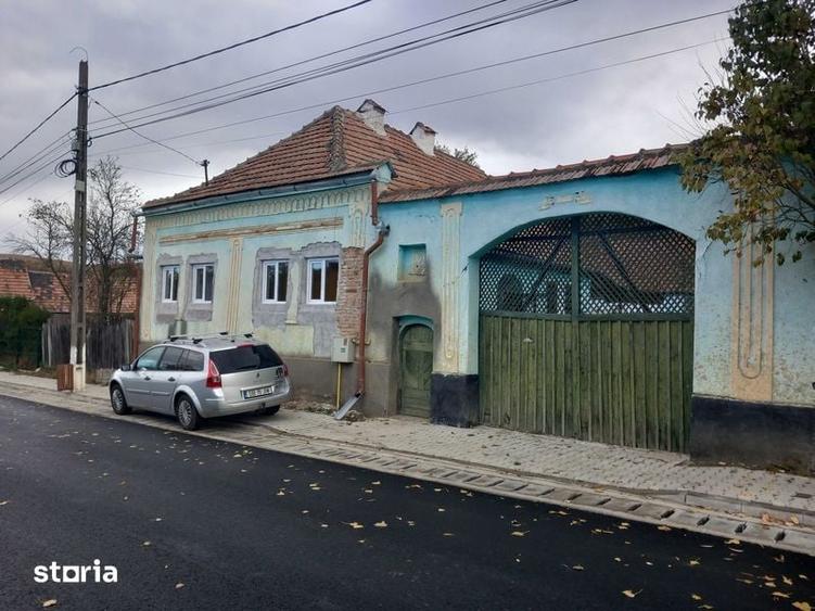casa de vanzare Sorostin teren generos - 1