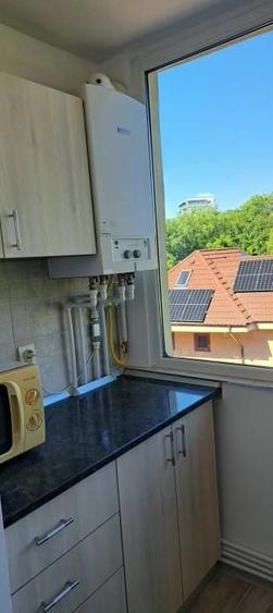 Apartament cu 2 camere decomandat, mobilat în Podul de Fier