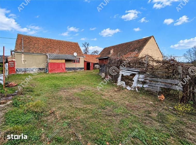 Casă cu 4 camere decomandat cu Teren 1650 Mp în Porumbacu de Jos