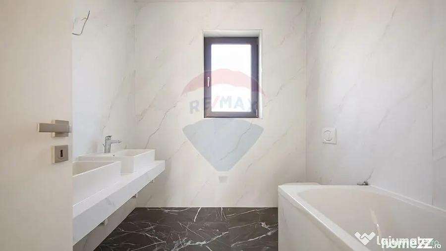 Casă cu 5 camere cu Teren 657 Mp în Hălchiu
