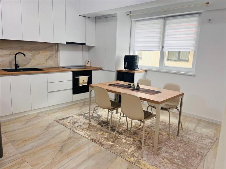 Apartament cu 2 camere semidecomandat, mobilat în Calea București
