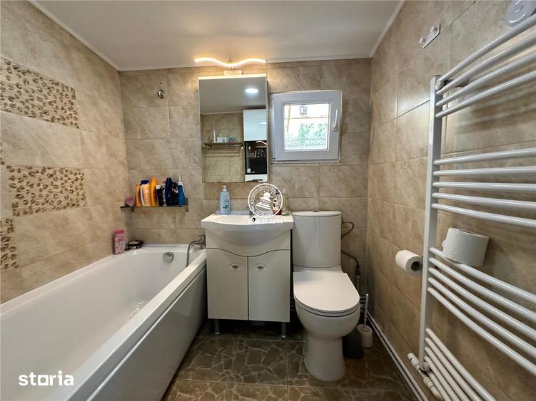 Casă cu 3 camere cu Teren 1318 Mp în Holboca