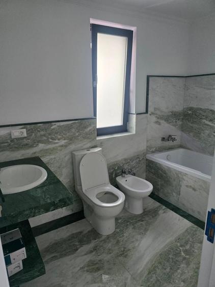 Casă cu 4 camere cu Teren 600 Mp în Central
