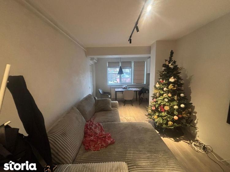 Apartament cu 3 camere semidecomandat, mobilat în Central