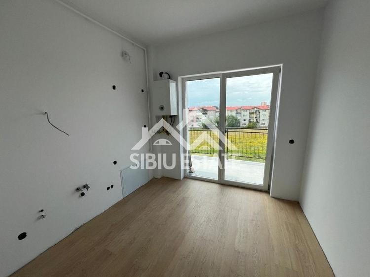 Apartament cu 2 camere decomandat în Șelimbăr — fotografia 2