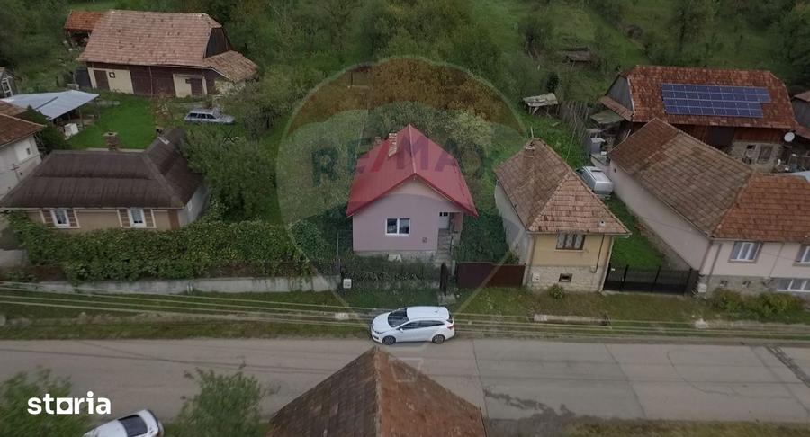 Casă cu 2 camere cu Teren 1102 Mp în Agăș