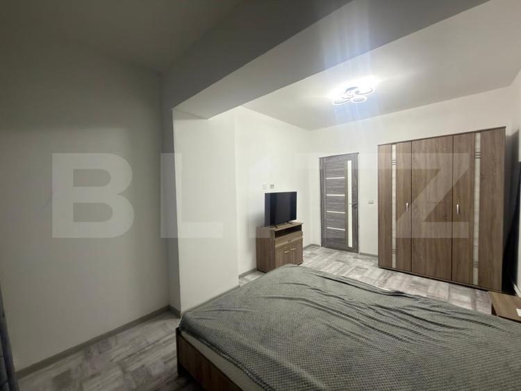 Apartament cu 2 camere semidecomandat, mobilat în Cornitoiu
