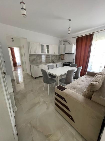Apartament cu 3 camere semidecomandat, mobilat în Giroc