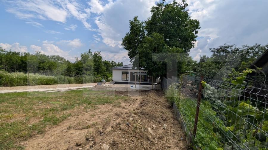 Casă individuală cu 3 camere cu Teren 900 Mp în Răzvad
