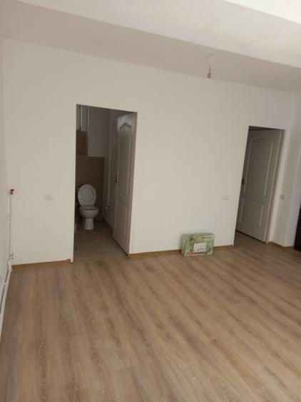 Garsonieră decomandată în