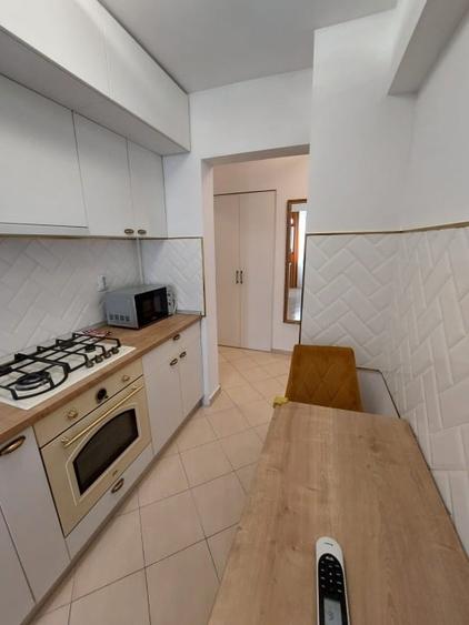 Apartament cu 2 camere decomandat, mobilat în Podul de Fier