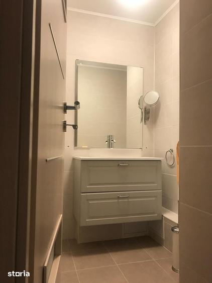 Apartament cu 3 camere semidecomandat în Rahova