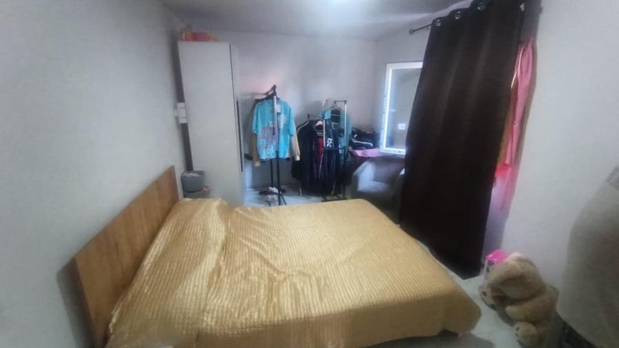 Casă cu 5 camere cu Teren 332 Mp în Central