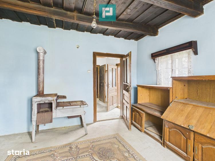 Casă cu 4 camere cu Teren 1080 Mp în Dezna