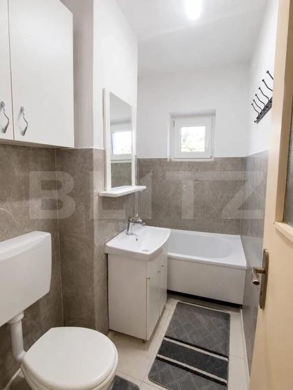 Apartament cu 3 camere semidecomandat în Central